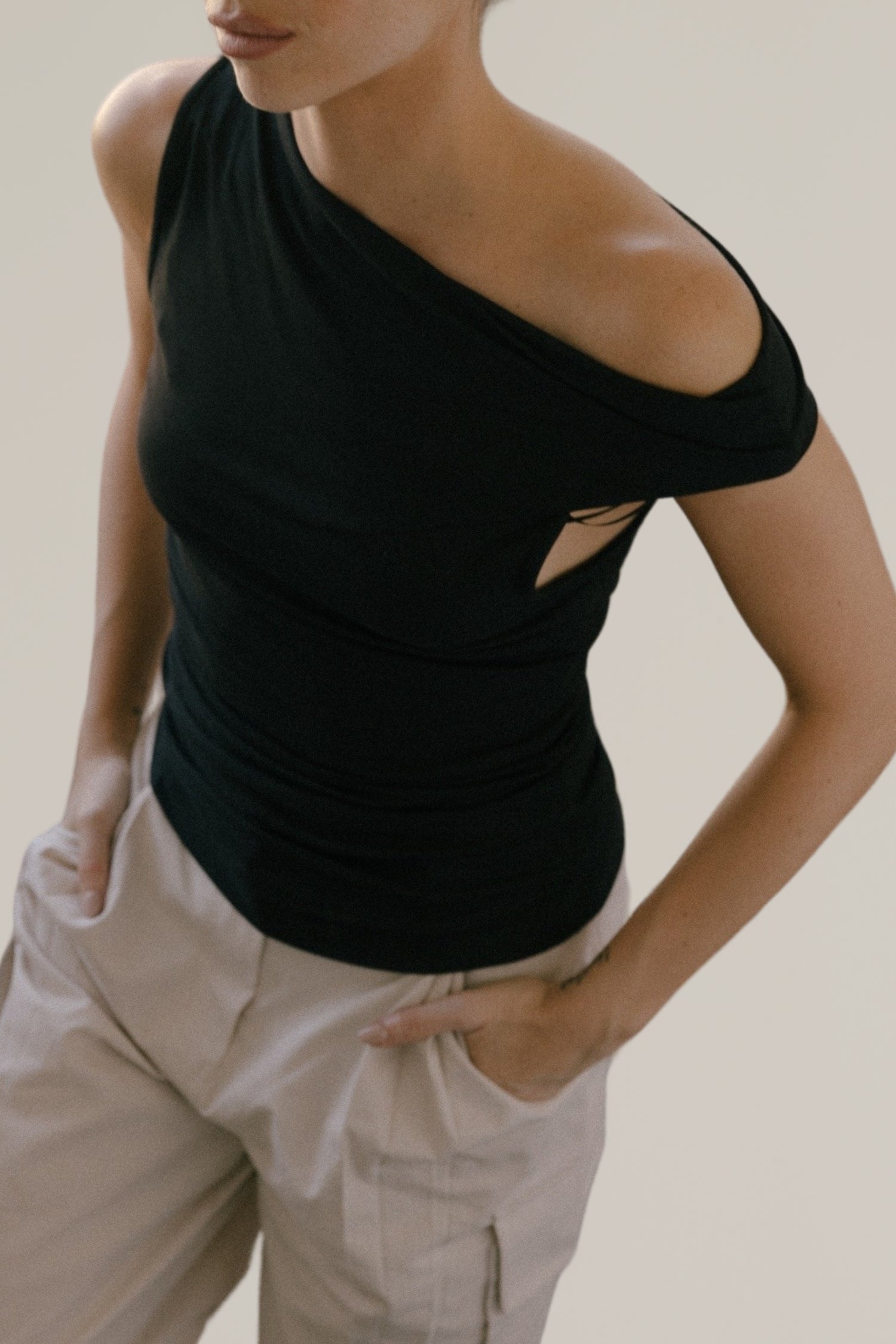 asymmetrical twist shoulder top