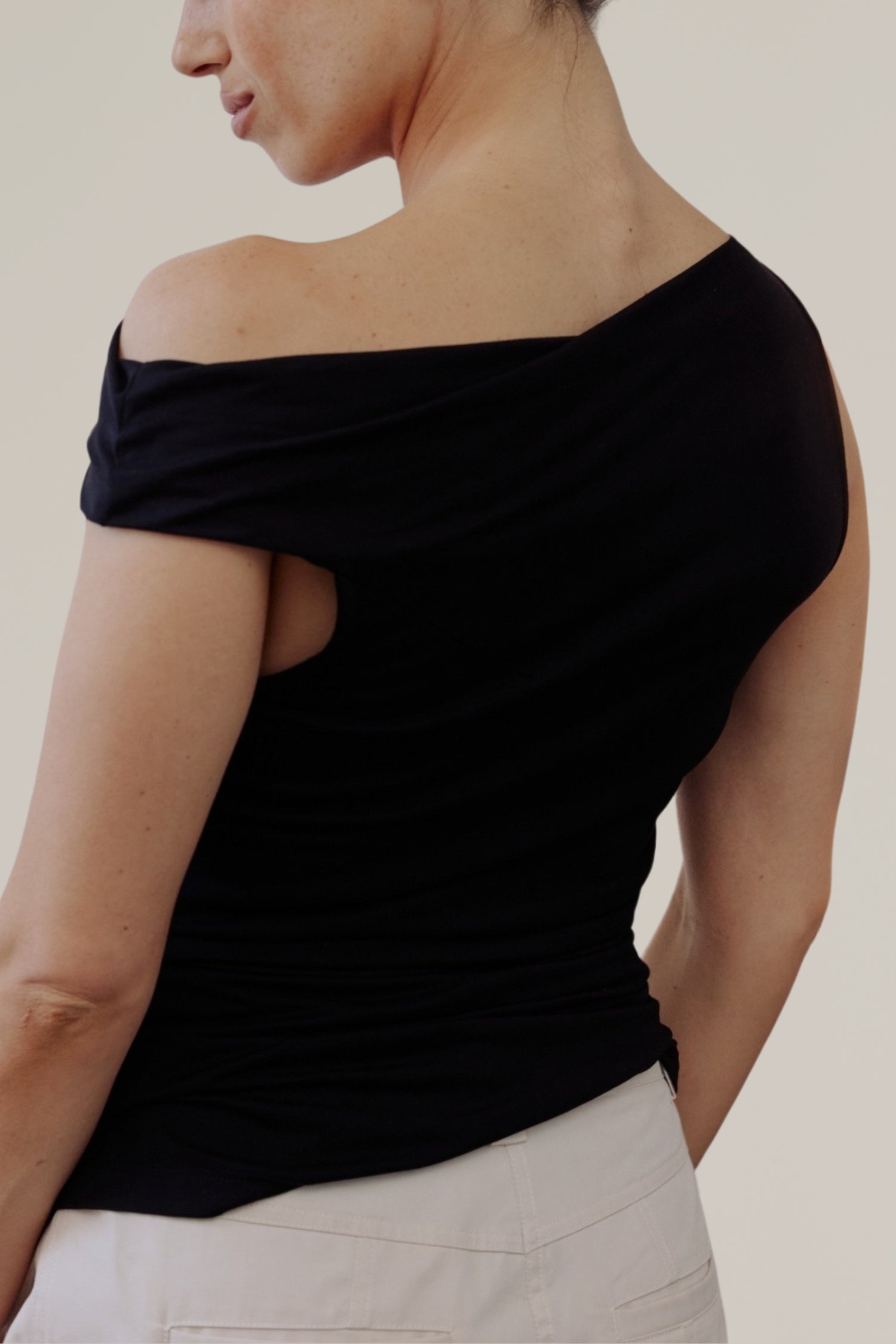 asymmetrical twist shoulder top
