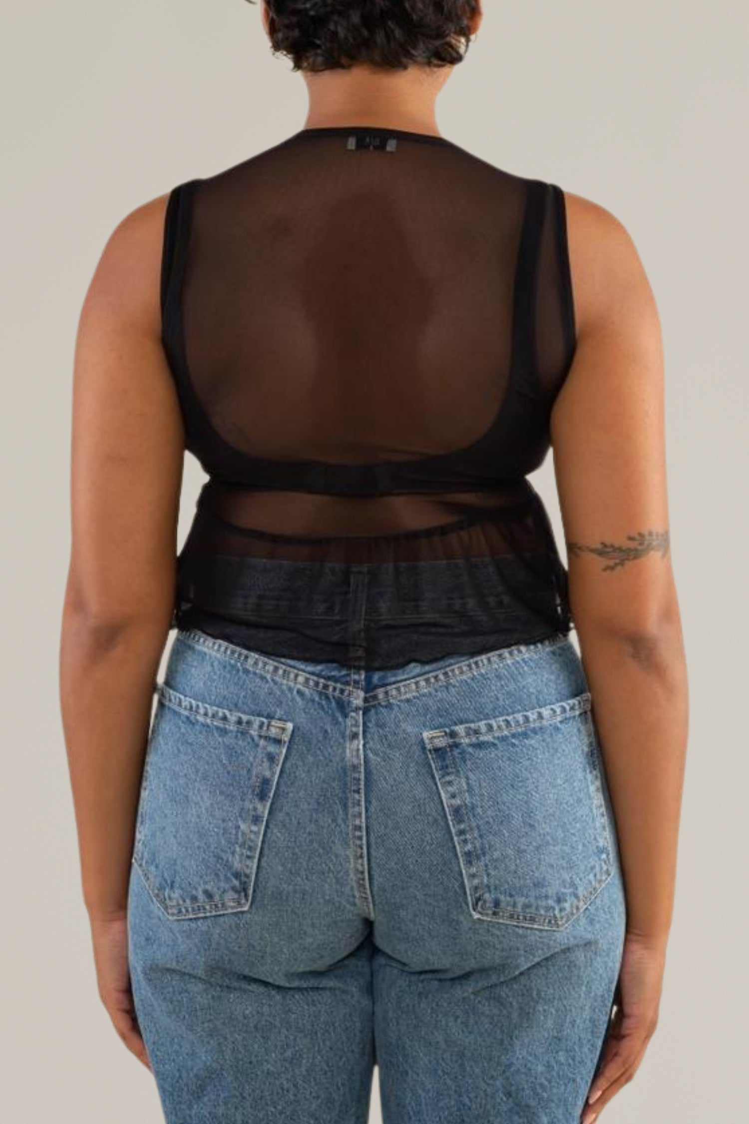 sleeveless mesh peplum tank top