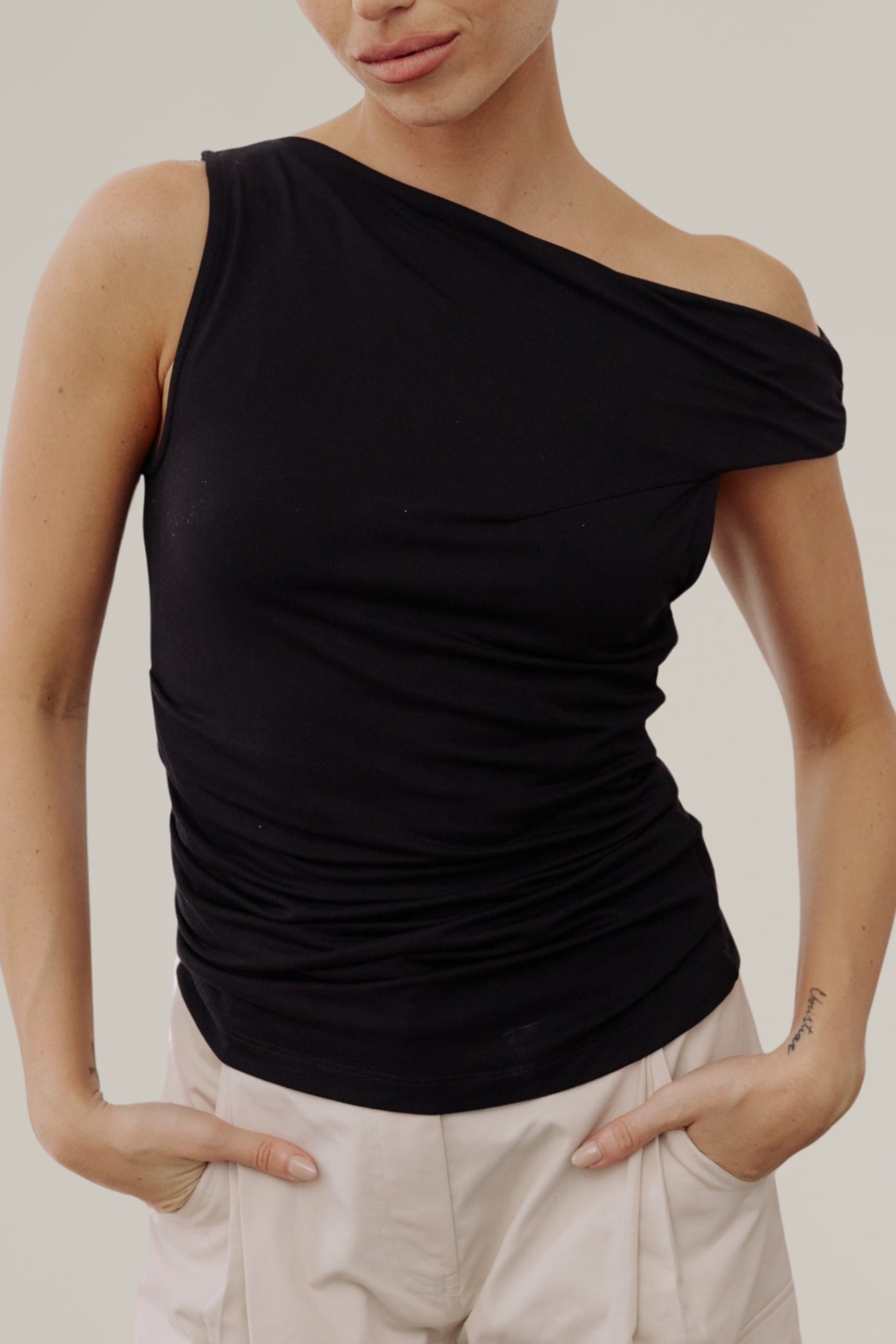 asymmetrical twist shoulder top