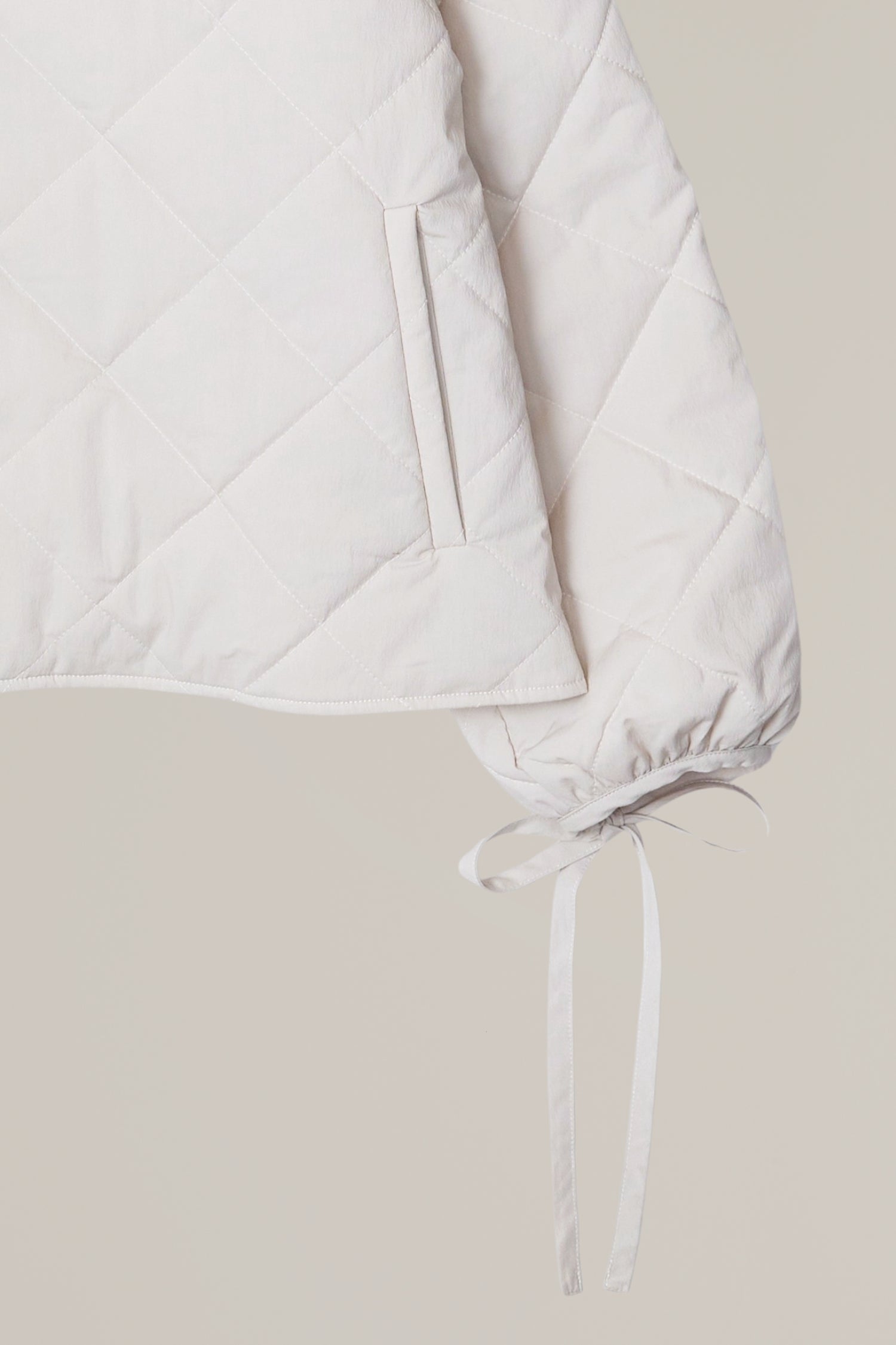 tie sleeve quilted jacket
