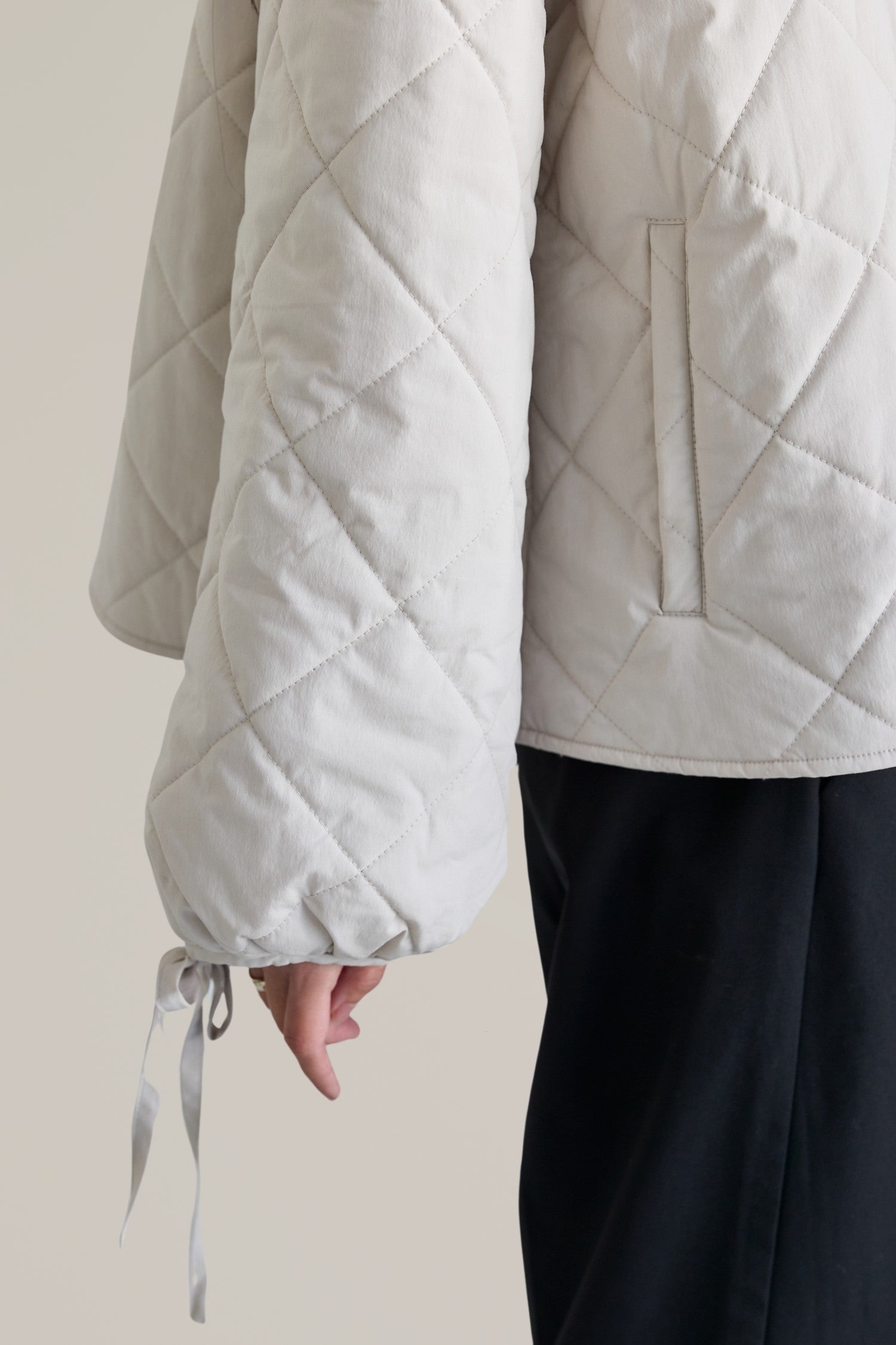 tie sleeve quilted jacket