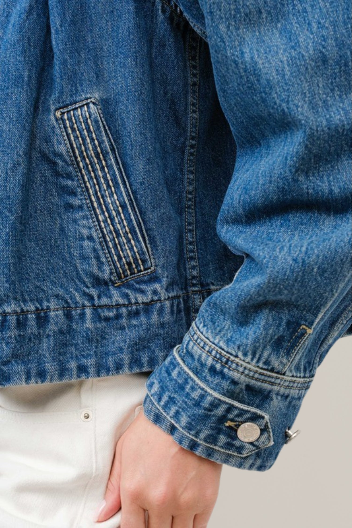 pleated denim jacket with stitch detail